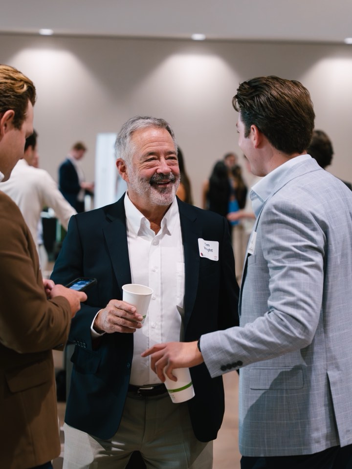 Guests talking at a networking reception