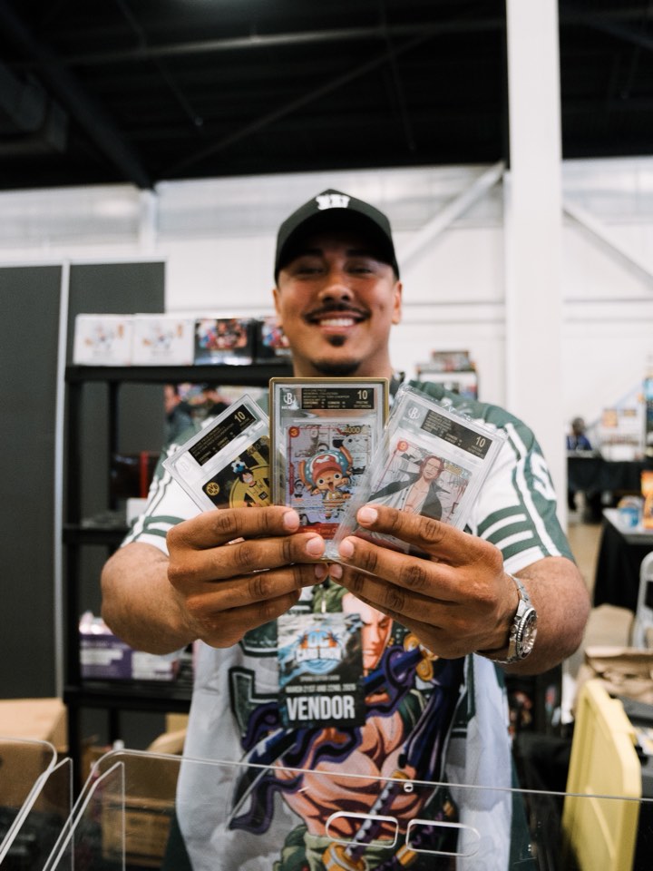 Buyer inspecting trading cards at a show