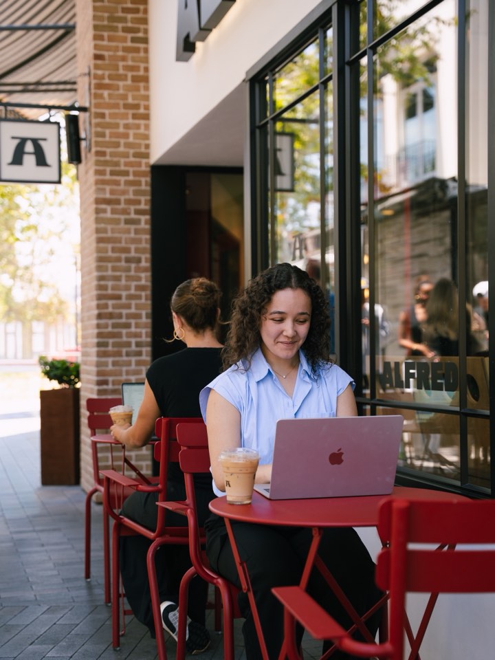 Working portrait at a pavement cafe