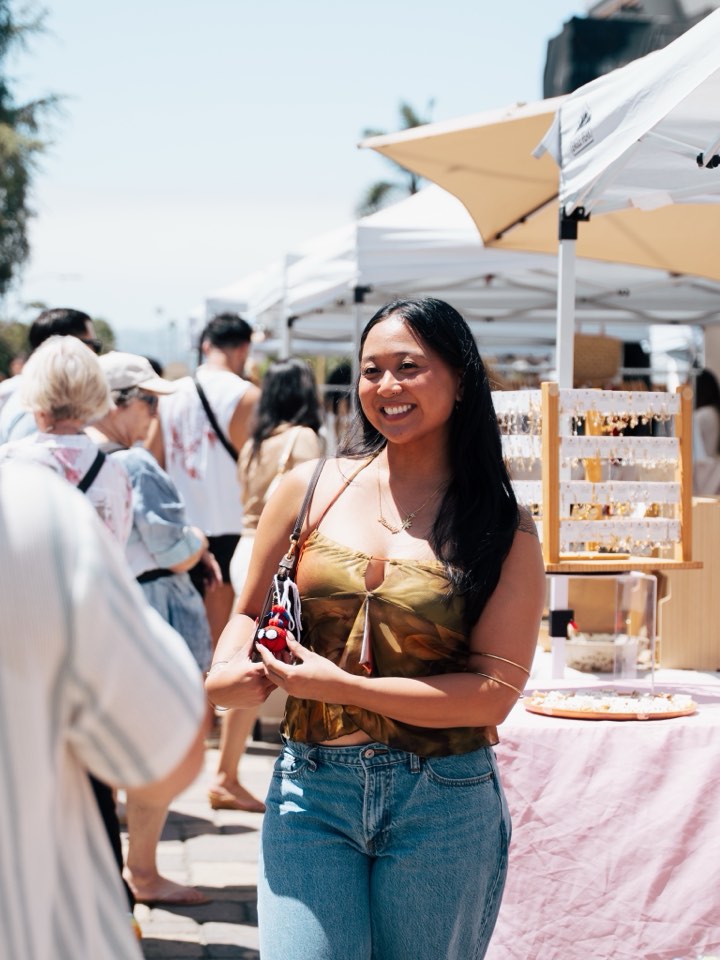 Founder photographed at an outdoor market